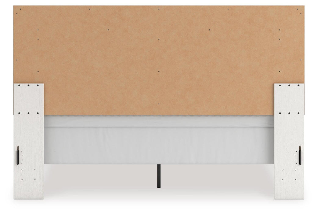 Zuraleus King Upholstered Panel Bed, Dresser, Mirror, Chest and Nightstand
